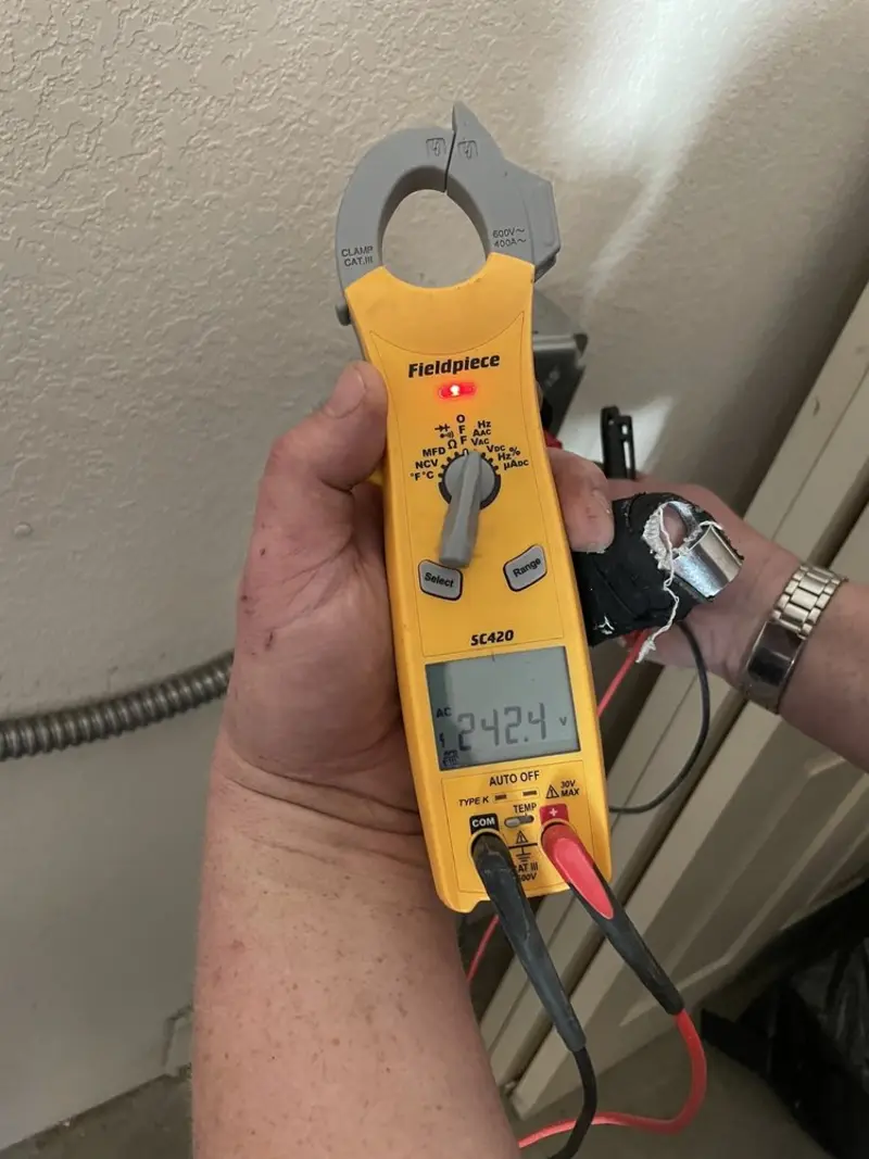 Voltage testing with clamp meter during Generator Installation in Helena